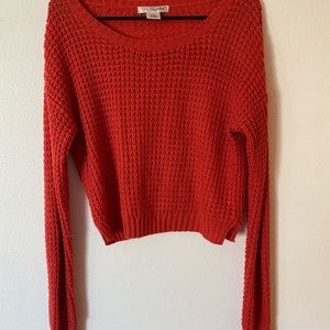 Lighter sweater. Knitted material.